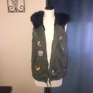 Listicle -  Faux fur lined Army represented Vest